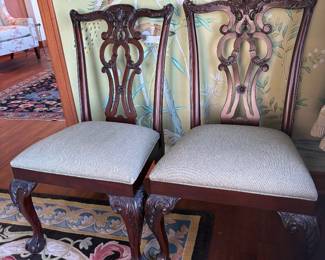 $750. Pair of Chippendale style antique chairs.  Each is 22 inches wide by 20 inches deep by 39 inches high.
