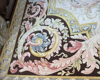 $5800 custom rug 12'6“ x 19‘ coordinates with another rug shown with sofas. Center medallions are different.  