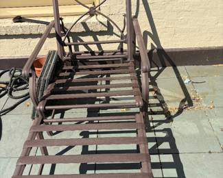 Vintage Brown Jordan metal framed gliding chair with matching ottoman no cushions available. Chair is 28 inches wide by 32 inches deep by 40 inches high. Ottoman is 24.5 in.² by 13 inches high.