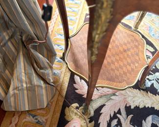Close-up of the detailing on the table, legs, and the shelf underneath