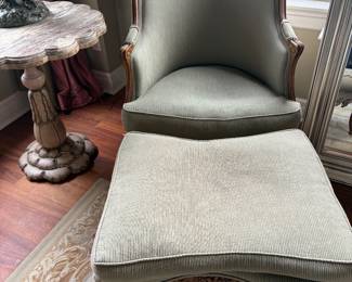 $360. Custom upholstered antique barrel style chair with ottoman. 28 inches wide by 20 inches deep by 35 inches high.  Ottoman measures 28 inches wide 22 inches deep by 17 inches high.
