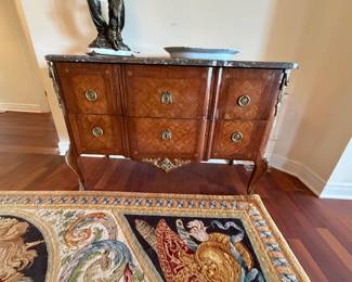$840. Antique marble top chest with two drawers. 50 inches wide by 21.5 inches deep by 33 inches high.