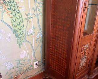Detailing on the sides of the armoire.