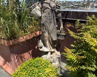 Female statue on a pedestal. 16 1/4 inches diameter by 67 1/2 inches high.