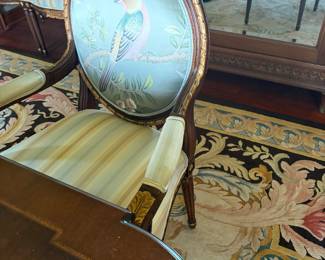 Close up view of one of the armchairs.   Each measure 25 1/2 inches wide by 20 inches deep by 40 1/2 inches high.
