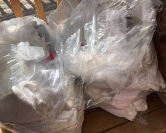 4 garbage bags of clean dog towels or cleaning rags 