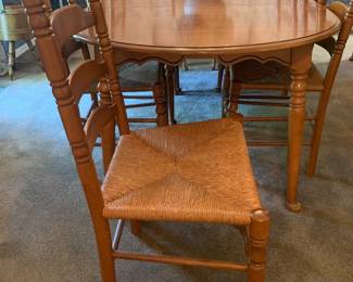 maple dining table and 10 chairs