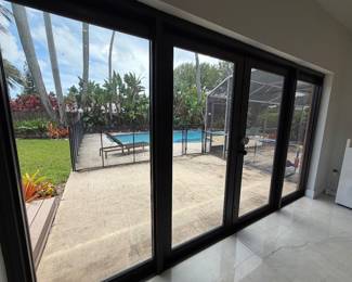 Luxury Hurricane Impact Glass Door System – Modern Black Aluminum