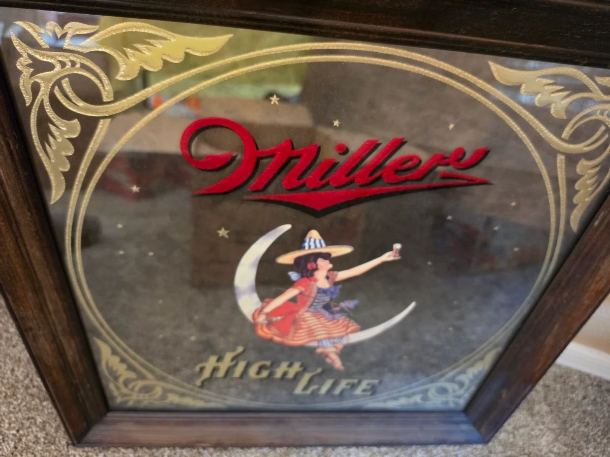 Many mirrored beer signs