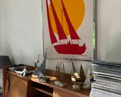 assorted model airplanes and sailboat picture