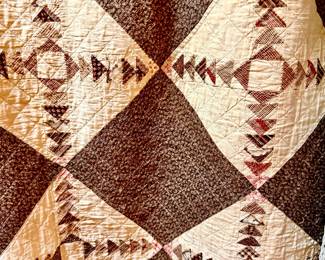 Antique mater brown quilt.
