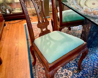 Chippendale style dining chairs.