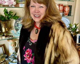 Christi sporting a Russian Fitch fur coat.