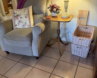 side table, storage baskets and armchairs