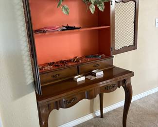 Display cabinet with flip down desk