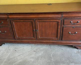 Desk with keyboard and file drawers