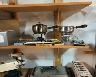 Fondue pots and forks, serving trays
