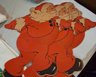 Large Cardboard Die-Cut Santas with Moveable Legs, $20 ea