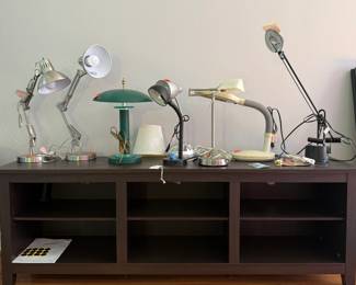 Large Entertainment Center and Many Lamps