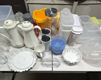 Table of glass and plastic kitchen ware, coffee carafes