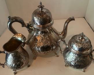 Vintage International Silver Georgian Court Silverplated Tea Pot, Sugar and Creamer set, hand chased (repoussé technique) elaborate design