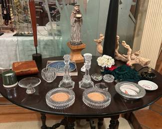 Table of miscellaneous collectibles, Tiffany signed candlestick holders.