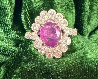 Beautiful pink sapphire with diamonds and platinum