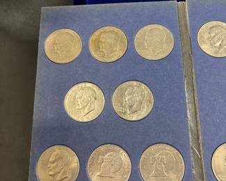Two complete runs of Eisenhower silver dollars