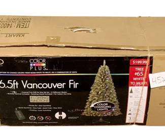 310 - 6.5ft Artificial Pre-lit Christmas Tree (Description): Vancouver Fir Used as is electric/electronic/mechanical item. No guarantee all components, untested
