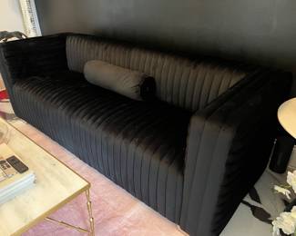 Tov black velvet couch with silver feet. 88”w x 32”d x 29”h. 