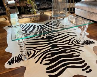 Glass and stacked acrylic coffee table.