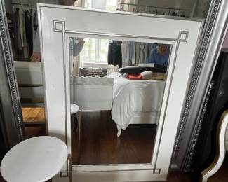 White lacquer rectangular mirror with raised silver trim. 36w x 48h