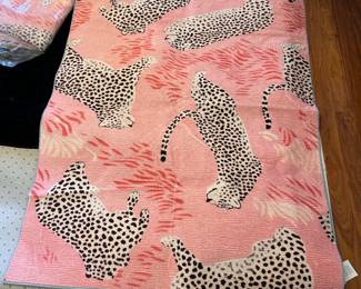 2 pink animal print throw rugs
