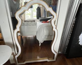 White arched mirror with gold painted trim. 42h x 29.5w