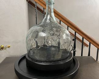 Demijohn bottle cloche on wood base + black lazy susan