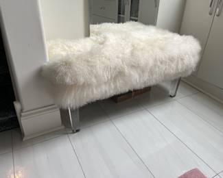 Restoration Hardware bench with lucite legs and fur top. 39”w x 17”d x 18”h