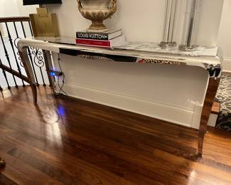 Console table 76”w x 14.5”d x 31”h. silver frame with marble inset. 