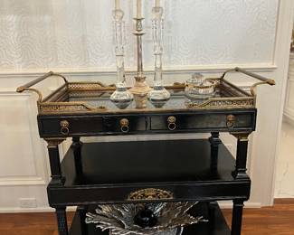 Marge Carson 3 tier serving cart. Brass gallery rail, black marble top,4 drawers with lion head pulls.  36”w x 21”d x 37”h.