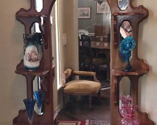 Beautiful House filled with beautiful things! More Pictures to come.This Victorian walnut etagere features a white marble top base and elaborate carvings on the crest. 