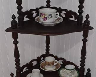 Corner Shelf lots of Tea Cups Throughout the House