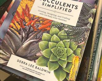 A rather sizable collection of books on succulents.