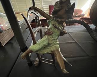 Bronze girl with kitten