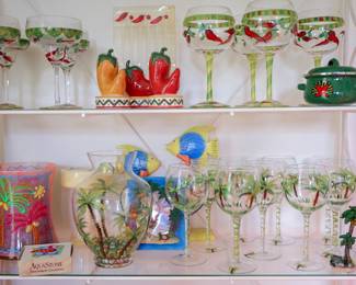 Hand-Painted Tropical Glassware Collection A beautiful collection of hand-painted tropical glassware and coastal accents featuring palm trees, island scenes, and vibrant beach-inspired colors. Includes: Set of hand-painted palm tree wine glasses Hand-painted tropical glass vase with palm tree motif Decorative tropical fish accent pieces Coastal-themed decorative tray Palm tree tabletop figurine AquaStone absorbent coaster set Assorted tropical décor accents Perfect for entertaining, a beach house, Florida room, tiki bar, lake home, or anyone who loves tropical and coastal décor.