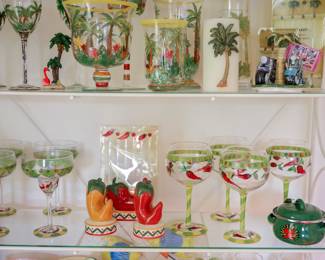 Hand-Painted Chili Pepper Entertaining Collection Colorful hand-painted chili pepper themed glassware and kitchen accessories, perfect for Southwestern, Mexican, Tex-Mex, or casual entertaining décor. Collection Includes: Set of oversized hand-painted margarita glasses featuring vibrant red chili pepper designs Coordinating hand-painted stemmed goblets with matching chili pepper motif Matching ceramic salt and pepper shakers shaped as chili peppers Decorative chili pepper cocktail stirrer set Mini enamel chili pepper cooking pot with lid Coordinating hand-painted drinkware and serving accessories Bright, festive pieces that add a fun splash of color to a kitchen, bar area, patio, or entertaining space.