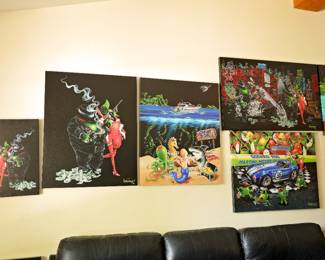 Michael Godard Lithograph Collection A collection of vibrant and highly collectible Michael Godard lithographs featuring the artist's signature whimsical style, playful olives, martini themes, luxury lifestyle scenes, and colorful storytelling imagery. Professionally stretched canvas and framed pieces available. Excellent condition and impressive display sizes.