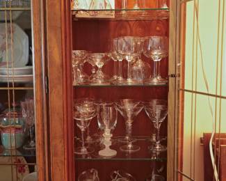Assorted Crystal & Stemware Collection Beautiful assortment of crystal and glass stemware displayed in the Drexel Heritage china cabinet. Includes a variety of entertaining and serving pieces suitable for both everyday use and special occasions. Collection Includes: Crystal champagne flutes Wine glasses Martini glasses Margarita glasses Coupe and dessert glasses Cordial and liqueur glasses Assorted crystal serving pieces Decorative crystal vases Beer and souvenir glasses Glass mugs and specialty drinkware A nice mix of barware, entertaining pieces, and decorative crystal, with many pieces available individually throughout the sale.