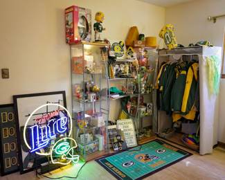 Calling All Green Bay Packers Fans! An incredible collection of Green Bay Packers memorabilia, collectibles, apparel, and fan gear accumulated over many years. Whether you're a lifelong Packers supporter, collector, or looking to outfit your game room, this collection has something for every fan. Featured Items Include: Large illuminated Miller Lite / Green Bay Packers neon sign Green Bay Packers collectibles and memorabilia Display cases filled with Packers keepsakes Packers bobbleheads and figurines Packers helmets and novelty items Collectible mugs, glasses, steins, and drinkware Packers signs and wall décor Packers-themed rugs and floor mats Apparel including jackets, jerseys, sweatshirts, hats, scarves, and fan wear Tailgating and game day accessories Vintage and modern Packers collectibles Football-themed memorabilia and promotional items Many items are new, collectible, vintage, retired, or hard to find.