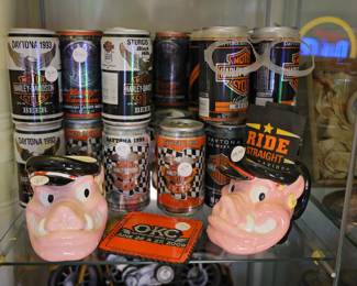 Vintage Harley-Davidson Rally Beer Can Collection & Biker Memorabilia A unique collection of vintage Harley-Davidson commemorative beer cans and motorcycle rally collectibles, featuring hard-to-find Daytona Bike Week and Sturgis Black Hills editions from the 1990s. Highlights Include: Harley-Davidson commemorative beer cans from Daytona Bike Week 1993, 1994, and 1995 Harley-Davidson Sturgis Black Hills Rally collectible beer cans Vintage Harley-Davidson branded beer cans and promotional items Pair of whimsical vintage Harley hog/pig character mugs Harley-Davidson rally coaster and biker memorabilia Additional Harley-themed novelty collectibles An excellent grouping for Harley enthusiasts, motorcycle memorabilia collectors, man cave décor, or anyone looking to add unique pieces from America's motorcycle culture.