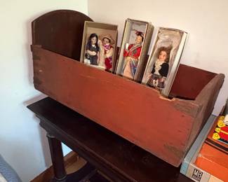 Antique Wooden Doll Cradle with Three Dolls