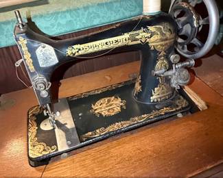 Antique Singer Sphinx Model Treadle Sewing Machine with Oak Cabinet fifth image
